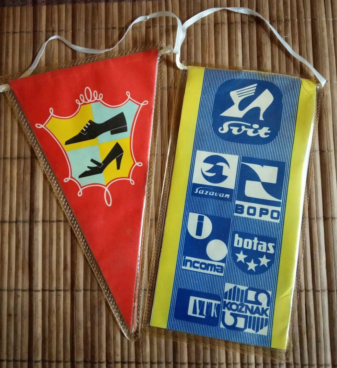 2 vintage advertising pennants