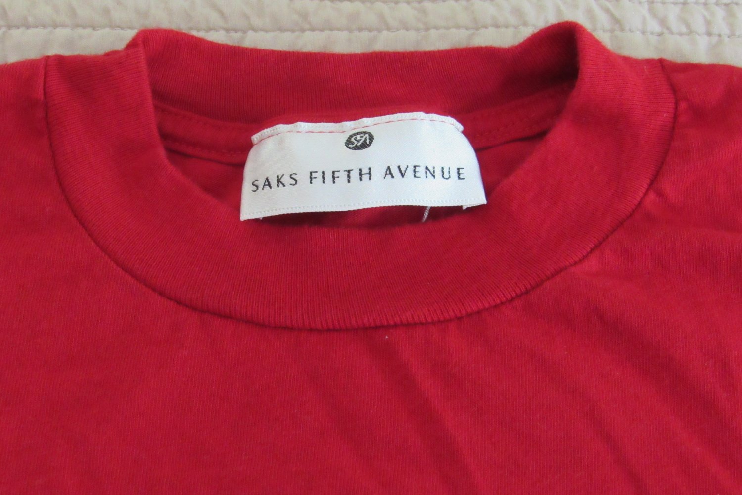 saks potts t shirt logo