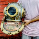 Boston copper brass diving helmet with wooden base Boston copper brass diving helmet with wooden base