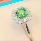 Tsavorite and Diamonds in a Vintage Style Platinum Ring Setting