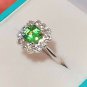 Tsavorite and Diamonds in a Vintage Style Platinum Ring Setting