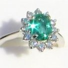 Natural Emerald and Diamonds in Classic Platinum Ring Setting