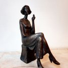 Realistic Bronze Sculpture, a Bronze Statue of a young girl with a cigarette