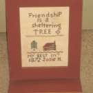 Cross stitch piece framed