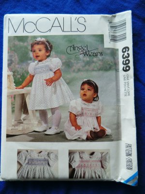 McCalls Pattern # 6399 UNCUT Baby Infant Dress Jumpsuit Smocking All Sizes