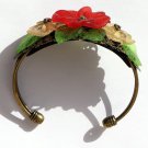 Bronze bracelet with three flowers and leaves in lucite: "Flora"