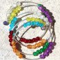Memory shape bracelet with 4 rows of multicolored cracked glass beads: "Fantasia"