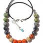 Necklace with seventeen multicolored ceramic beads on a leather cord: "Mexico"