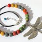 Necklace with eighteen multicolored ceramic beads adorned with a dragonfly "The Dragonfly"
