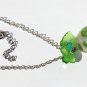Pendant with a four-leaf clover in a glass bead these pearls and leaves: "My lucky charm"