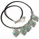 Necklace with five green gold and silver glass beads mounted on a rubber cord: "Malaga"