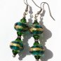 Silvered earrings with two green and gold glass beads:"Sweet twins"-Green