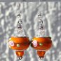 Silvered earrings with orange lampwork glass beads in relief: "Florange"