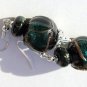 Baroque silvered earrings in lampwork glass with blue and green reflections: "Ballade à Venise"