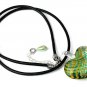 Pendant with a heart in greent and yellow stripes on leather cord:"ZÃ©brina"