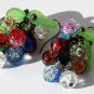 Bronze earrings with a cluster of multicolored and cracked glass beads and lucite leaves: "Grappa"
