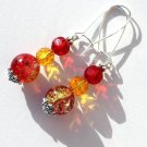 Silvered earrings with two-tone cracked red and yellow faceted pearls: "Cherry peach duo"