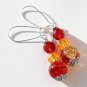 Silvered earrings with two-tone cracked red and yellow faceted pearls: "Cherry peach duo"