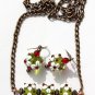 Bronze set with necklace and matching green lampwork earrings with white flowers:"Pomme Cerise"