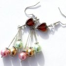 Silvered earrings with a heart and pearls of different colors: "Little hearts at the party"