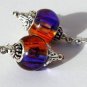 Silvered earrings with purple and copper two-tone glass beads: "Aube"