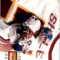1995 SkyBox Premium #154 John Elway/Shuler