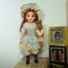Sweet little 2 3/4" Ooak (Artist) Dollhouse doll and mini Bunny baby