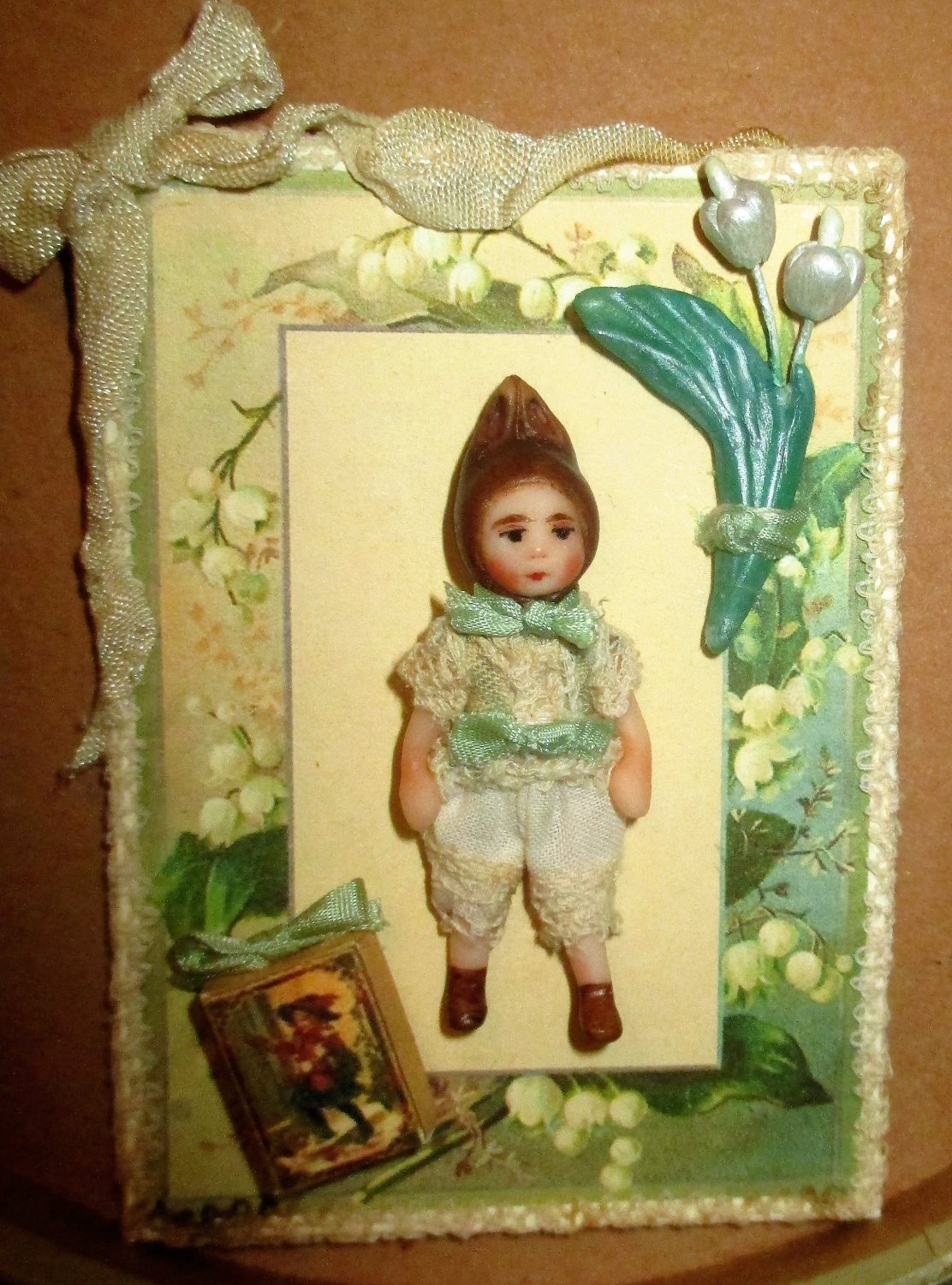 Littlest 1 3/4" OOAK (artist) Baby Bunny doll on Lily of the Valley Card