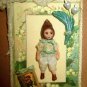 Littlest 1 3/4" OOAK (artist) Baby Bunny doll on Lily of the Valley Card