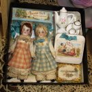 Two 3" All Bisque German Dolls in Box of Cacao and Tea