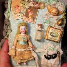 3" All Bisque Antique German Dollhouse doll on accessory card