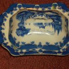 blue and white butter server