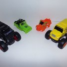 Lot of Four Interchangeable MONSTER TRUCKS Toys Two Chassis and Four Tops 5x4x4