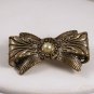 VINTAGE PIN BROOCH Old Ornate Figural Bow Imitation Pearl Cabochon Engraved