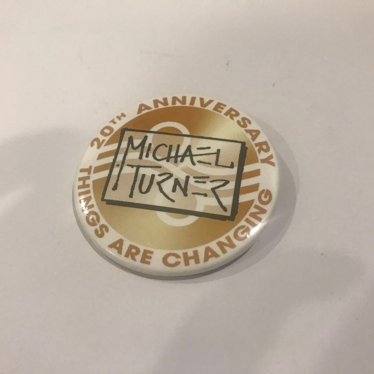 New Michael Turner 20th Anniversary Things are Changin Button from 2023 SDCC
