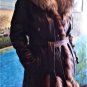 Women's leather jacket with fur trim.