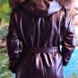 Women's leather jacket with fur trim.