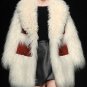 Tailoring of fur coats and jackets made of leather with fur .