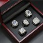 A Set Dallas Cowboys Super Bowl Championship Silver Rings With Wooden