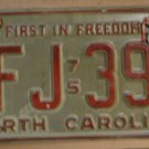 1975 North Carolina license plate AFJ 397 with July 1980 and 1982 stic