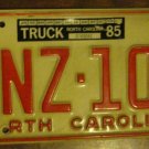 North Carolina license plate SNZ 103 with a 1985 truck sticker