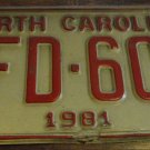 1981 YFD 607 North Carolina license plate with August 1990 stickers