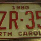 1980 VZR 351 North Carolina license plate with May 1985 stickers
