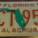 1993 GCT 95M Florida license plate with December sticker Alachua count