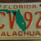 1993 GCV 92F Florida license plate with December sticker Alachua count