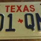 1989 201 QNR Texas license plate with January sticker