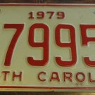 1979 H 79958 North Carolina license plate with October 1985 stickers
