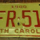 1980 TFR 513 North Carolina license plate with April 1986 stickers