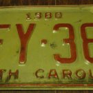 1980 TFY 383 North Carolina license plate with November 1985 stickers