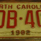 1982 ZDB 404 North Carolina license plate with January 1984 stickers